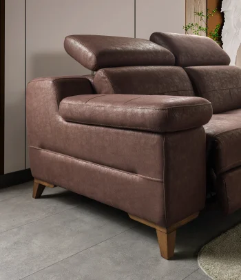 A detailed view of the Serena Motorized Triple Recliner, a premium brown three-seater sofa manufactured by Chairium, featuring extended motorized footrests and adjustable headrests on the outer seats.