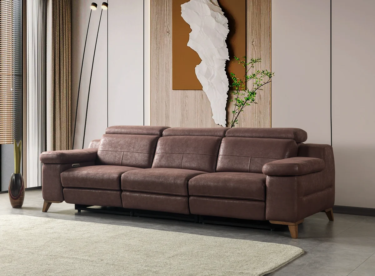 SERENA Triple Recliner Sofa Best Home Recriners from Turkey 2 A detailed view of the Serena Motorized Triple Recliner, a premium brown three-seater sofa manufactured by Chairium, featuring extended motorized footrests and adjustable headrests on the outer seats.