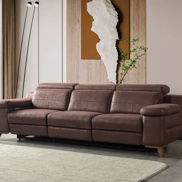 A detailed view of the Serena Motorized Triple Recliner, a premium brown three-seater sofa manufactured by Chairium, featuring extended motorized footrests and adjustable headrests on the outer seats.