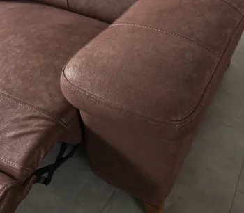 A detailed view of the Serena Motorized Double Recliner, a premium brown double sofa manufactured by Chairium, featuring extended motorized footrests and adjustable motorized headrests.