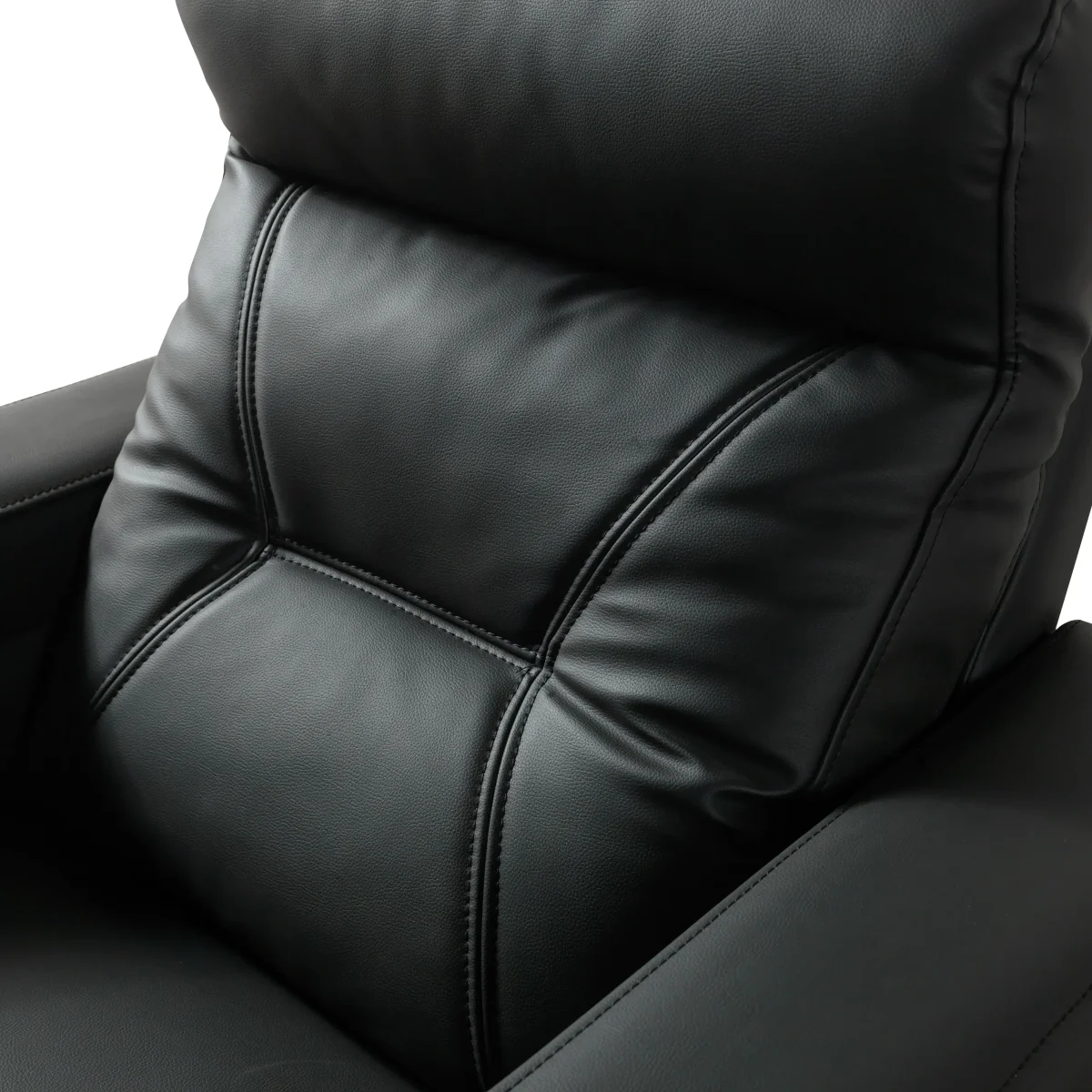 A front-facing view of the ZERO PLUS recliner, a luxurious black leather recliner chair with ergonomic stitched paneling and built-in cup holders. The recliner is centered on a light rug in a modern living room setting featuring elegant wood wall panels, accompanied by a tall woven vase holding decorative dry grass.