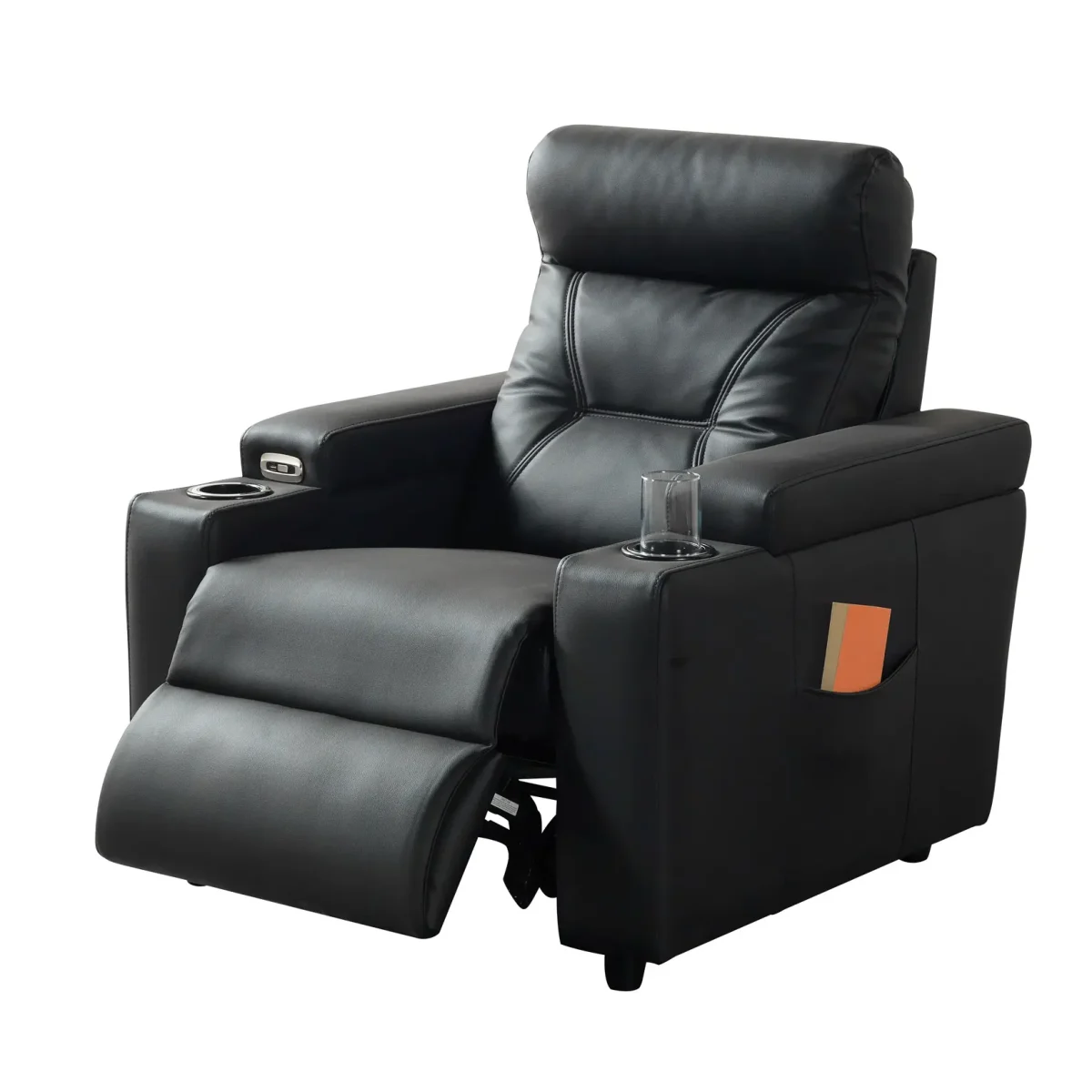 A front-facing view of the ZERO PLUS recliner, a luxurious black leather recliner chair with ergonomic stitched paneling and built-in cup holders. The recliner is centered on a light rug in a modern living room setting featuring elegant wood wall panels, accompanied by a tall woven vase holding decorative dry grass.
