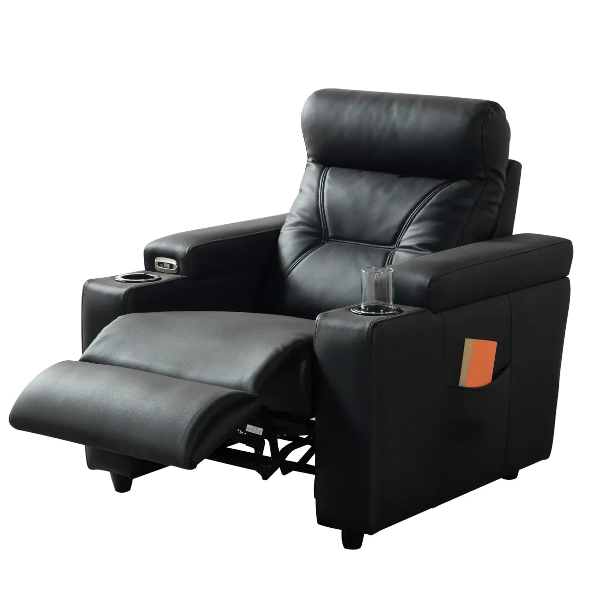 A front-facing view of the ZERO PLUS recliner, a luxurious black leather recliner chair with ergonomic stitched paneling and built-in cup holders. The recliner is centered on a light rug in a modern living room setting featuring elegant wood wall panels, accompanied by a tall woven vase holding decorative dry grass.